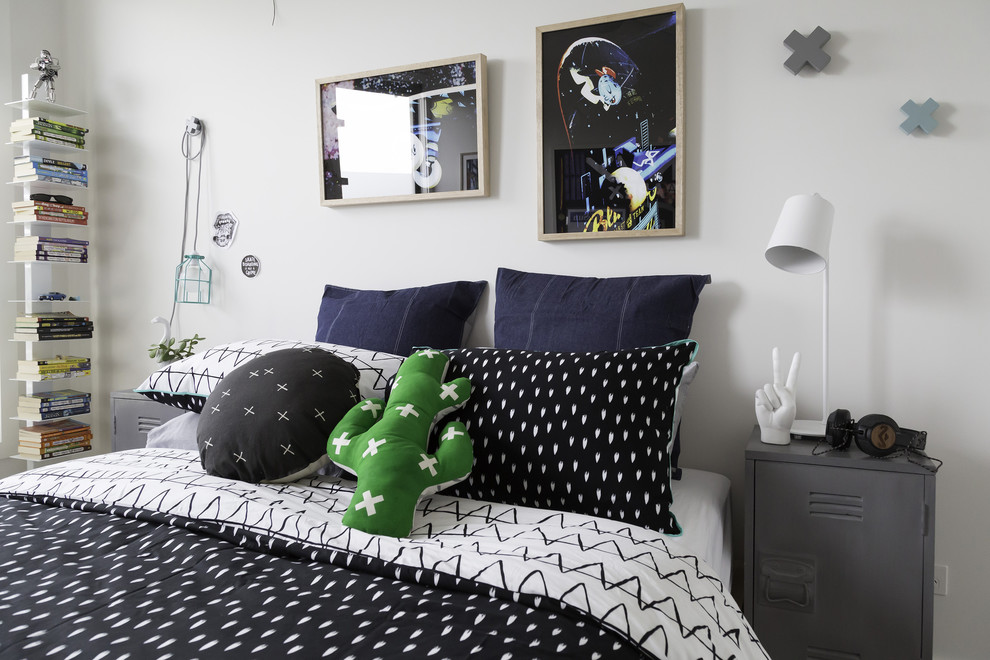 Photo of a mid-sized scandinavian kids' room for boys in Melbourne with white walls.