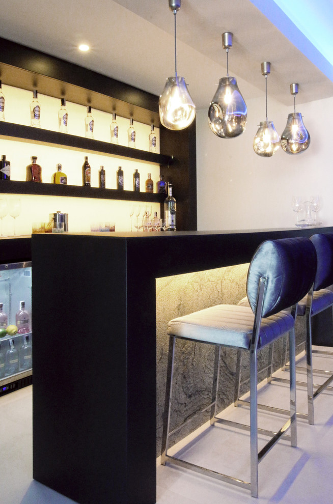 Inspiration for a modern home bar in Other.