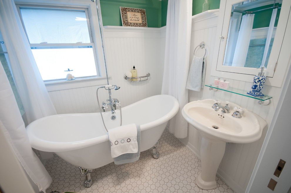 Design ideas for a medium sized traditional ensuite bathroom in Providence with white tiles, ceramic tiles, a claw-foot bath, a shower/bath combination, a two-piece toilet, a pedestal sink, green walls and ceramic flooring.