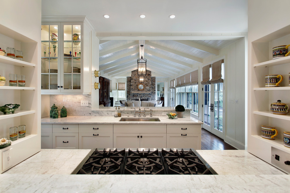 Inspiration for a traditional separate kitchen in Chicago with white cabinets and shaker cabinets.
