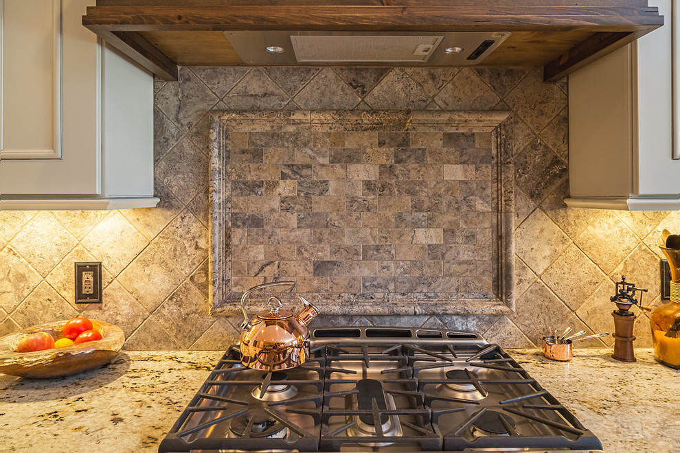Example of a mountain style home design design in Raleigh