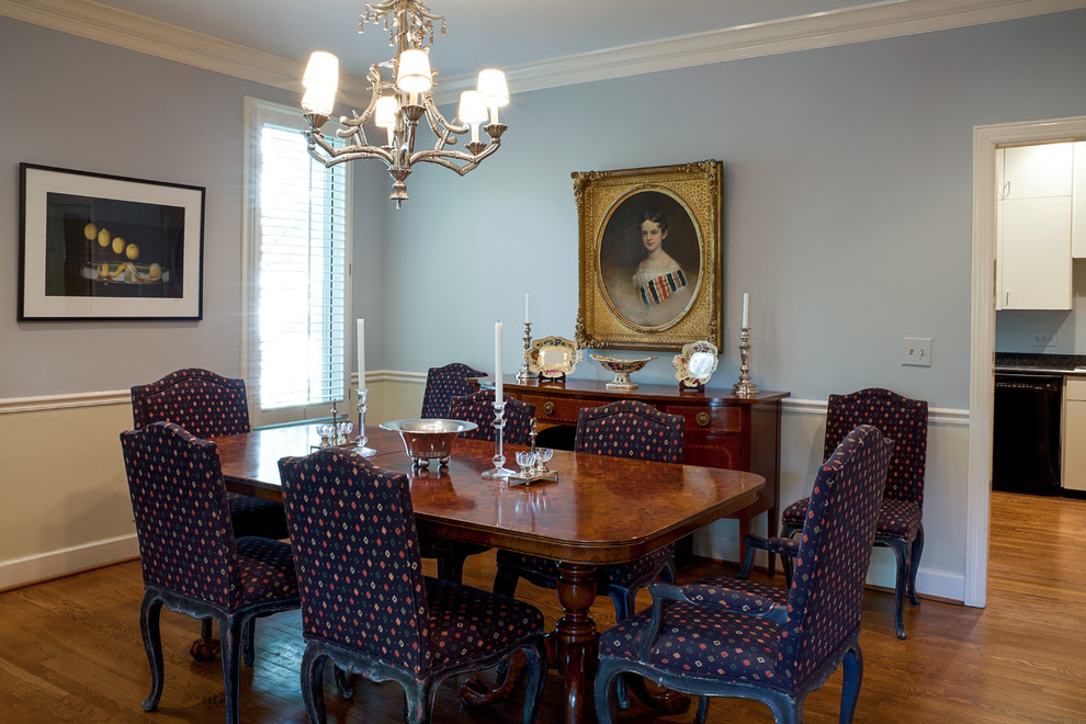 Inspiration for a mid-sized traditional separate dining room in Nashville with blue walls and medium hardwood floors.