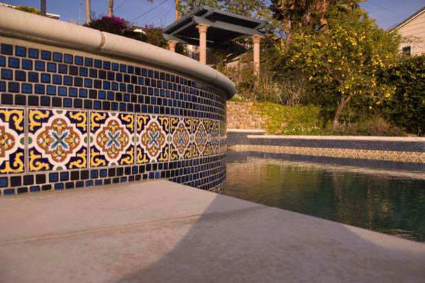 Example of a large transitional backyard custom-shaped and stamped concrete natural hot tub design in San Diego
