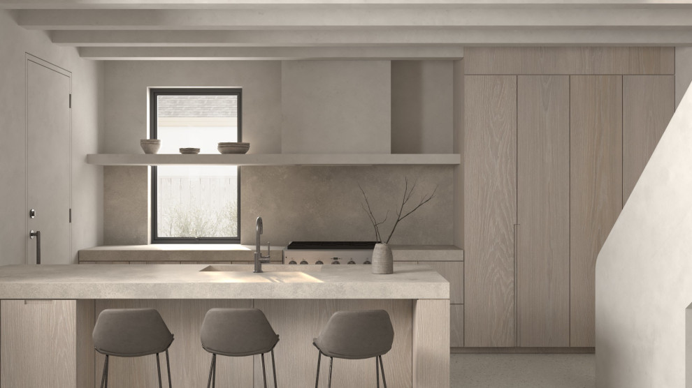 Bild på ett avskilt, mellanstort skandinaviskt grå grått u-kök, med en integrerad diskho, släta luckor, skåp i ljust trä, bänkskiva i betong, grått stänkskydd, stänkskydd i sten, rostfria vitvaror, betonggolv, en halv köksö och grått golv