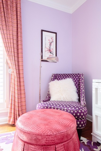 Design ideas for a small eclectic bedroom in Other with purple walls and medium hardwood floors.