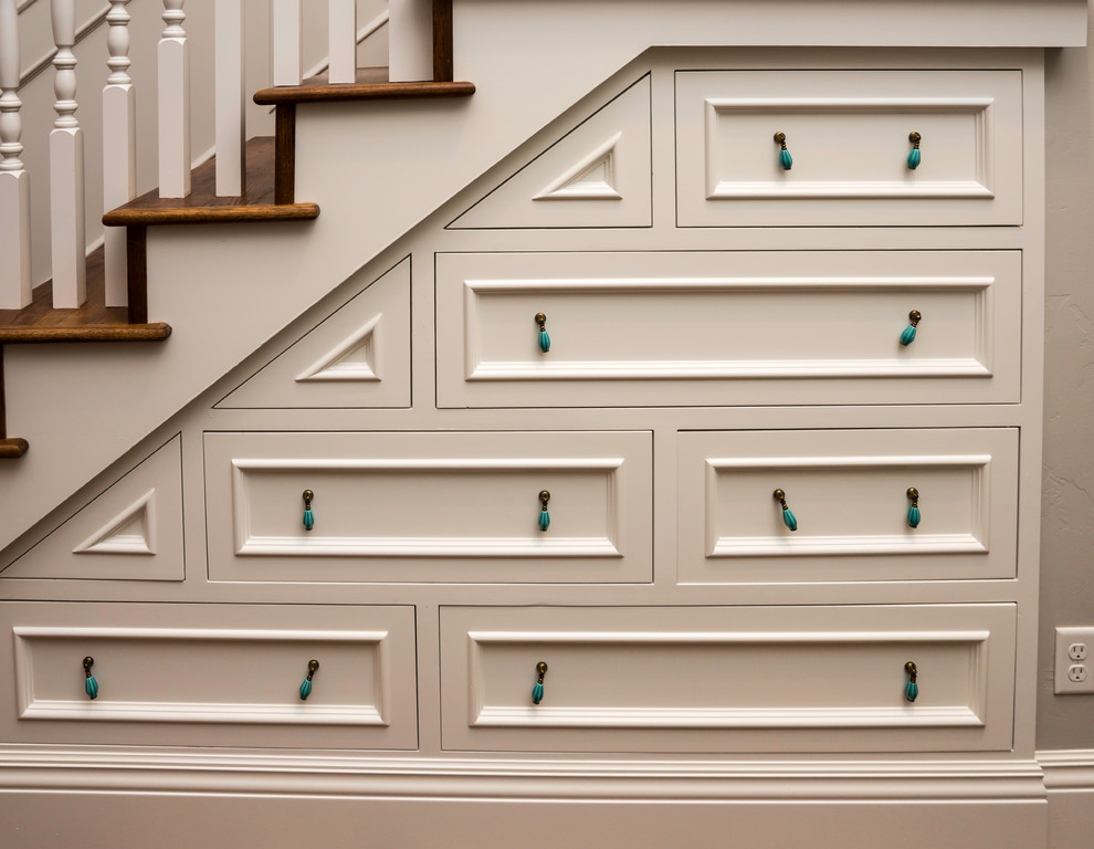 Inspiration for a mid-sized craftsman wooden l-shaped staircase remodel with wooden risers