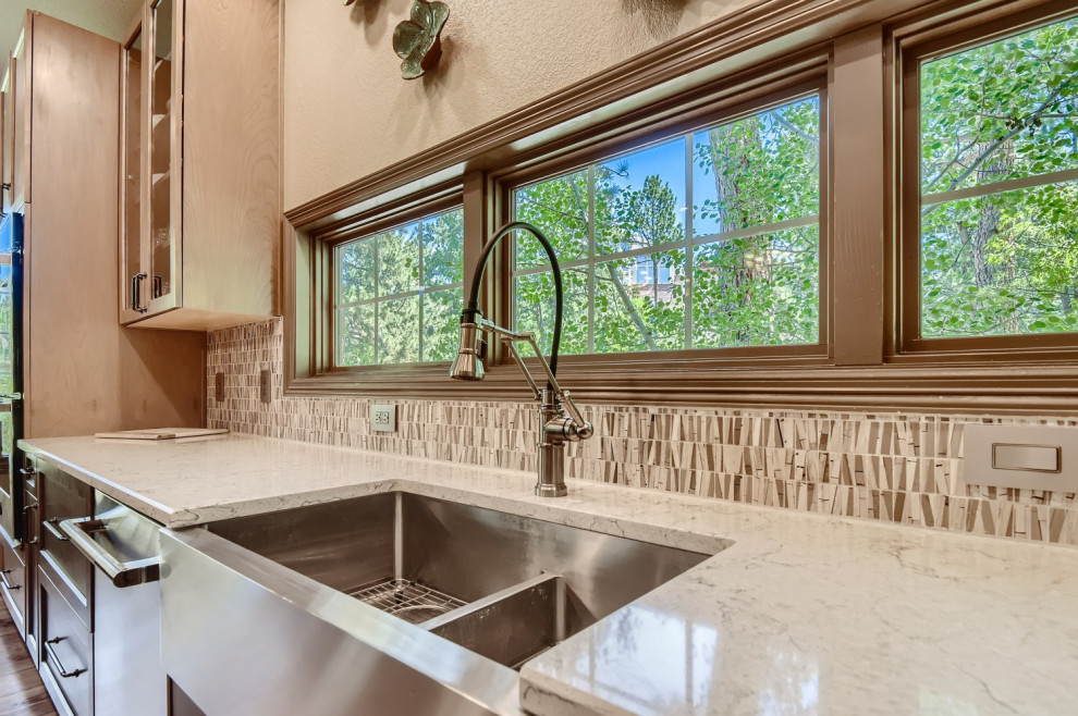Inspiration for a rustic kitchen remodel in Denver