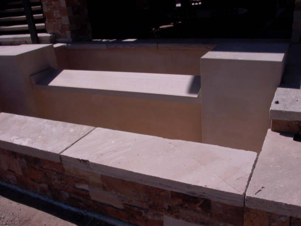Design ideas for a mid-sized rustic side yard water fountain landscape in Denver.