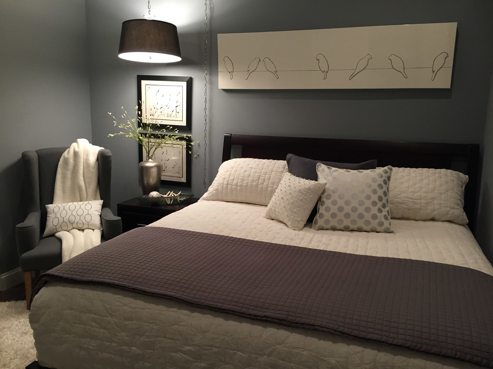 Inspiration for a mid-sized modern guest bedroom in Chicago with grey walls.