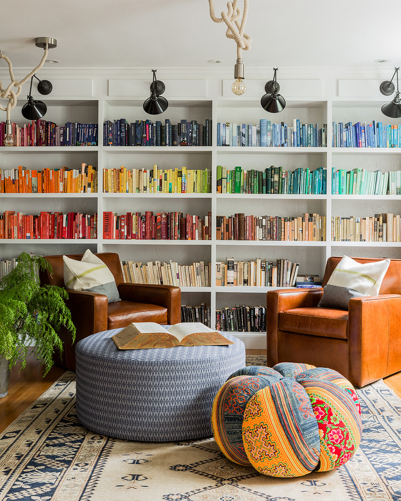 Eclectic family room in Boston with a library.