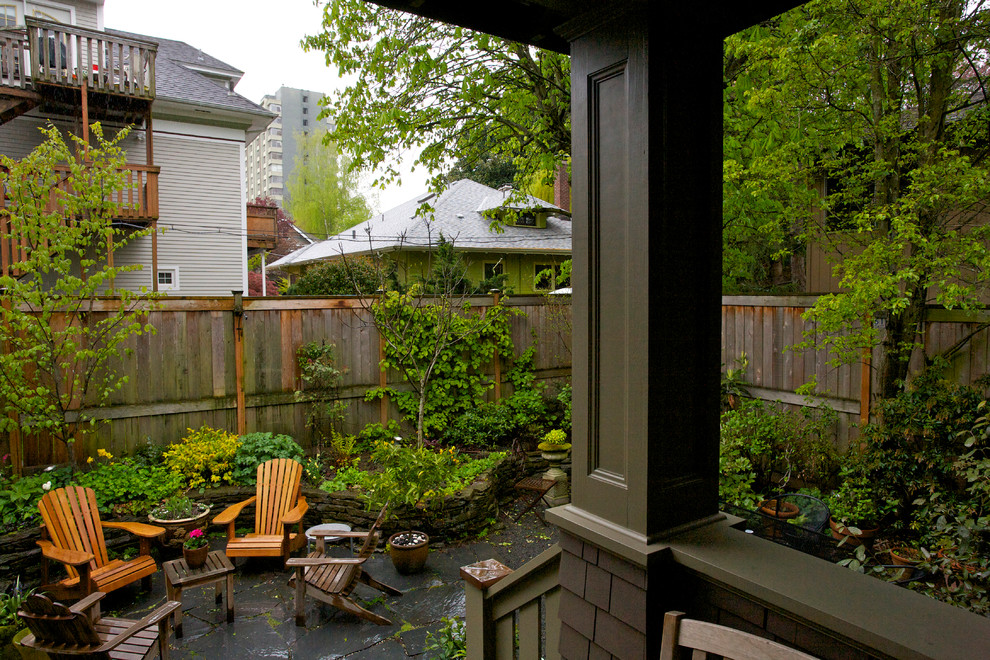 Photo of a traditional backyard patio in Portland.