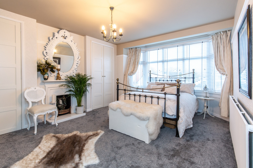 Elegant bedroom photo in Sussex