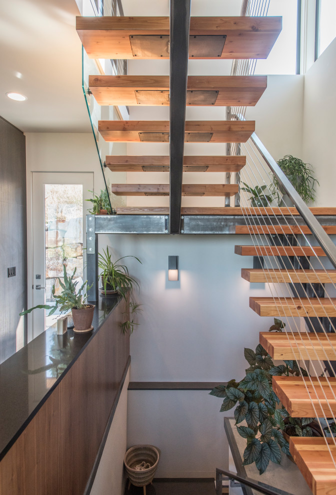 Design ideas for a mid-sized contemporary staircase in Boise.