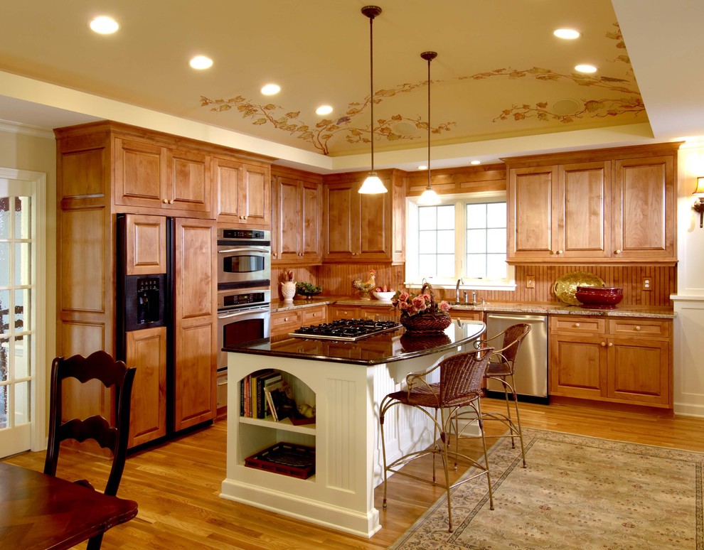 Design ideas for a traditional kitchen in Minneapolis with panelled appliances.