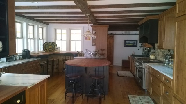 Restorations & Remodeling rustic-kitchen