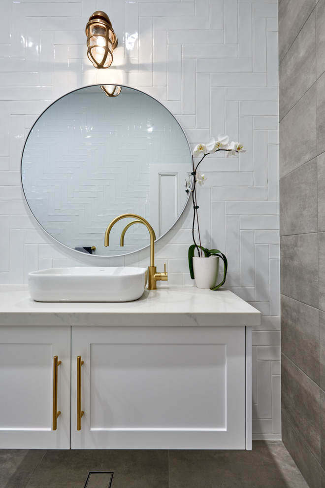 This is an example of a contemporary bathroom in Sydney with white tile.