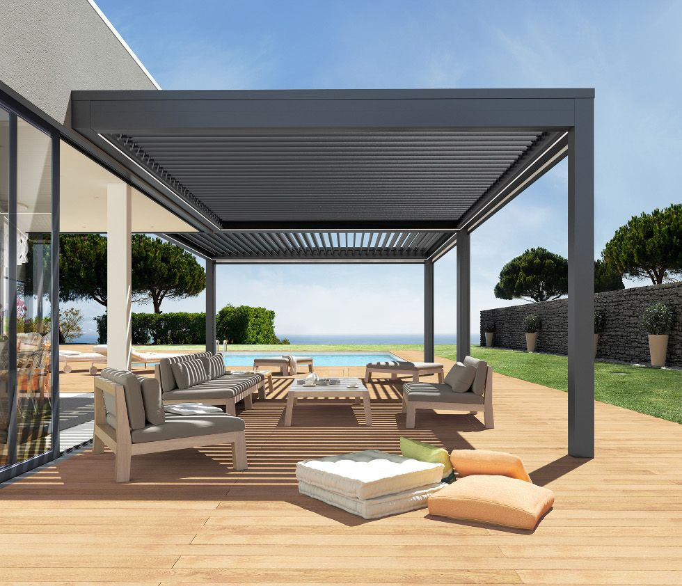This is an example of a mid-sized modern backyard patio in New York with decking and a pergola.