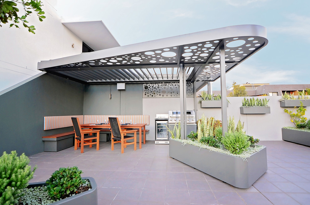 Design ideas for a contemporary rooftop and rooftop deck in Sydney with a container garden and a pergola.