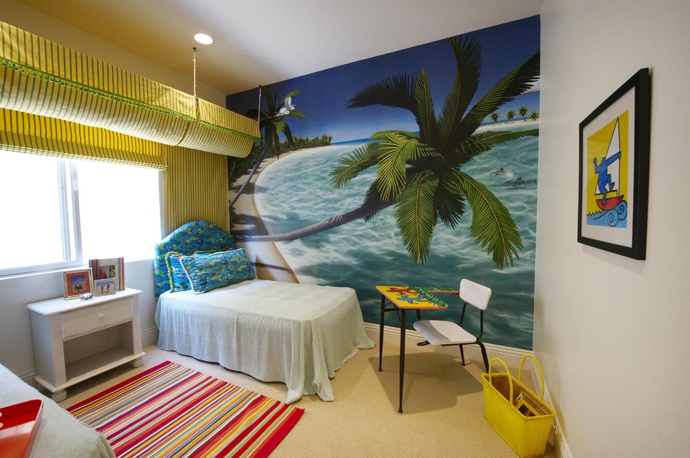This is an example of a tropical gender-neutral kids' room in Los Angeles with carpet and multi-coloured walls.