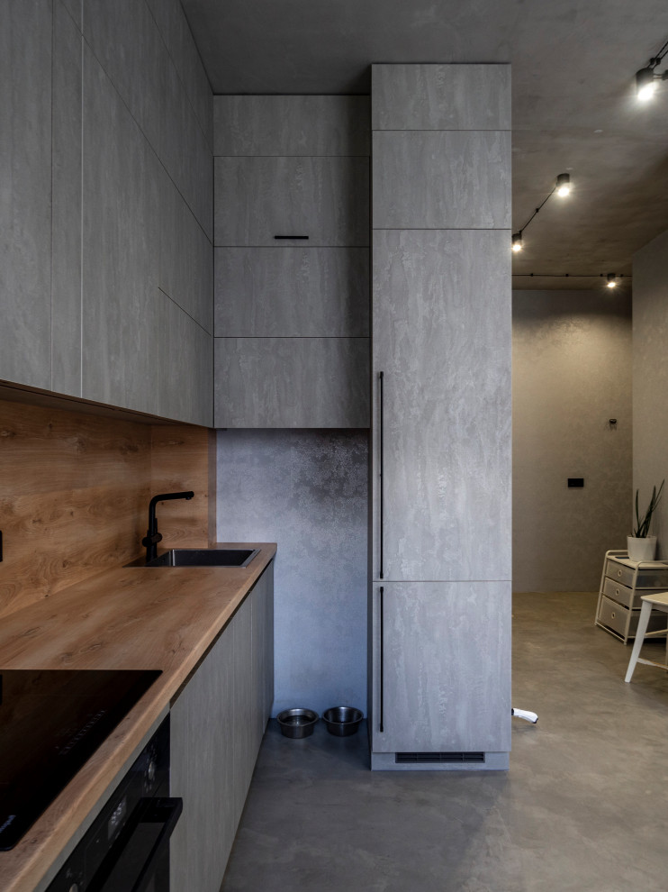 Элегантная минималистичная кухня в сером цвете
