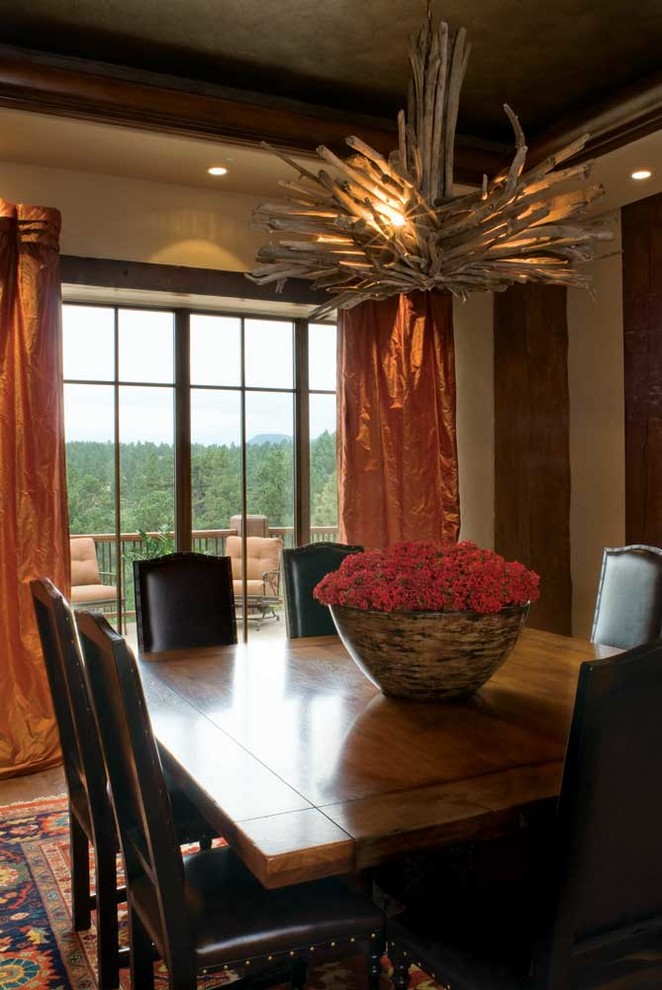 Inspiration for a rustic dining room remodel in Denver