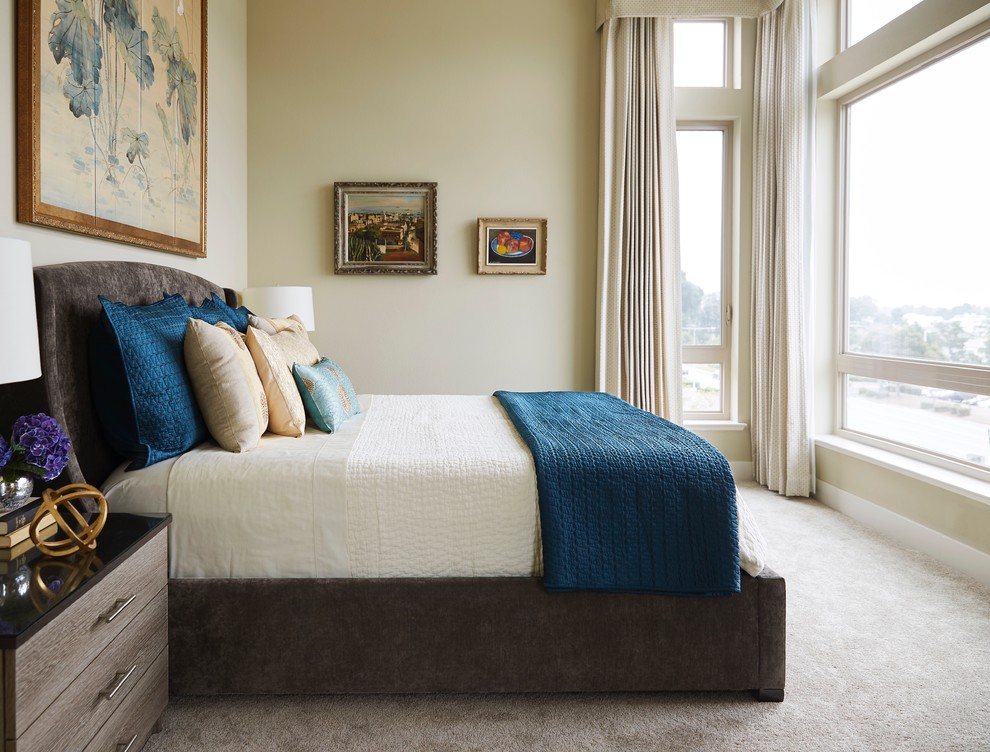 Inspiration for a transitional bedroom in San Francisco with beige walls, carpet and grey floor.