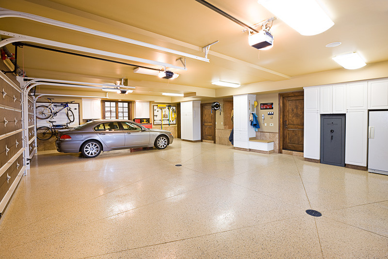 Garage - rustic attached four-car garage idea