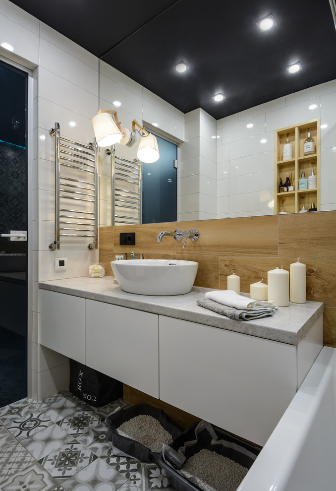 Design ideas for a small contemporary master bathroom in Novosibirsk with flat-panel cabinets, white cabinets, an undermount tub, a shower/bathtub combo, a wall-mount toilet, black and white tile, porcelain tile, grey walls, porcelain floors, a drop-in sink, laminate benchtops, grey floor, a shower curtain and grey benchtops.