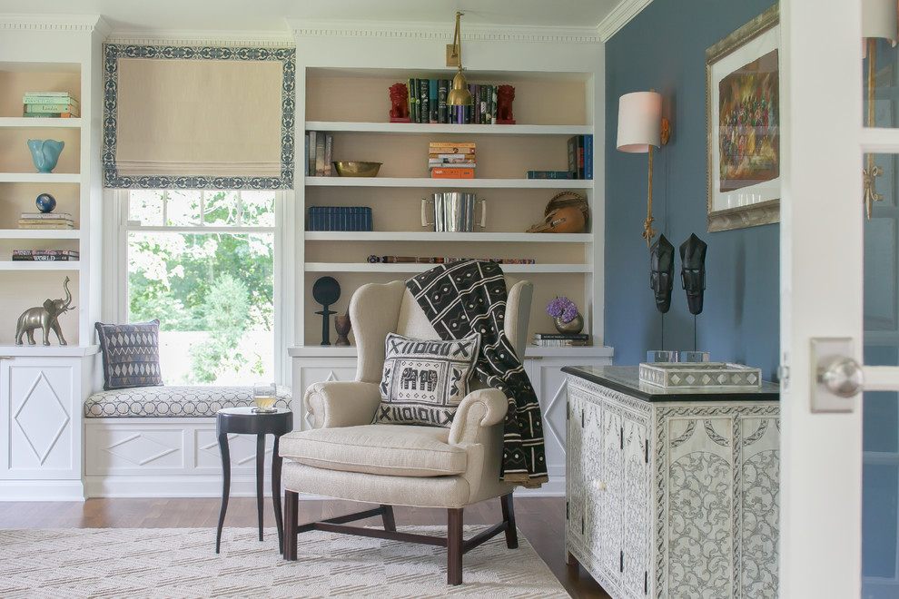 Mid-sized transitional formal medium tone wood floor living room photo in New York with blue walls, no fireplace and no tv