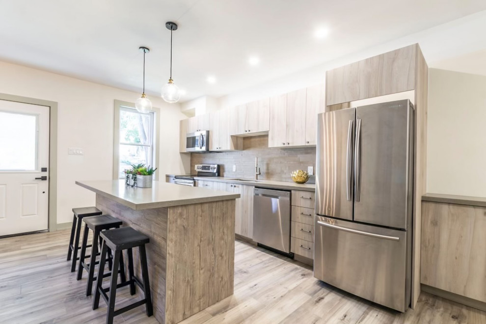 Example of a minimalist kitchen design in Toronto