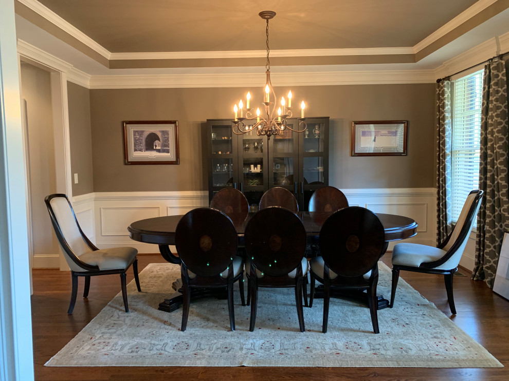 How to hang two different sized prints?