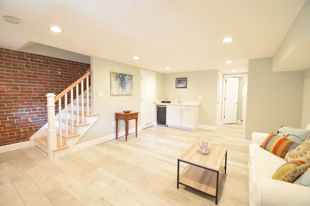 Mid-sized transitional walk-out basement in DC Metro with grey walls, ceramic floors and multi-coloured floor.
