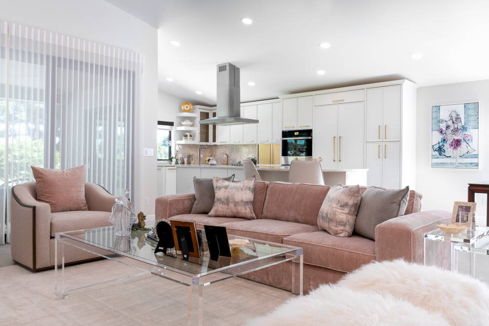 Example of a transitional vaulted ceiling living room design in Miami with white walls