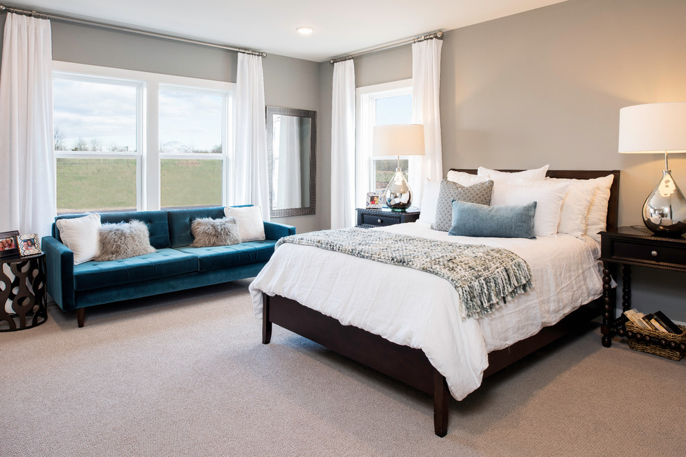 Photo of a transitional master bedroom in DC Metro with grey walls, carpet and grey floor.