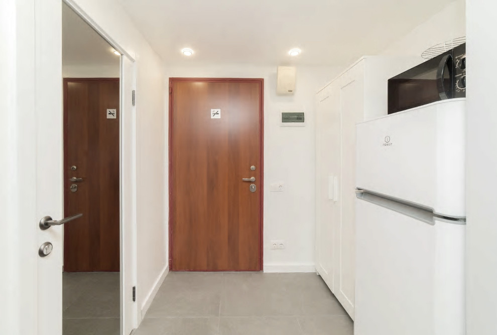 Двухэтажная студия, обшитая деревом