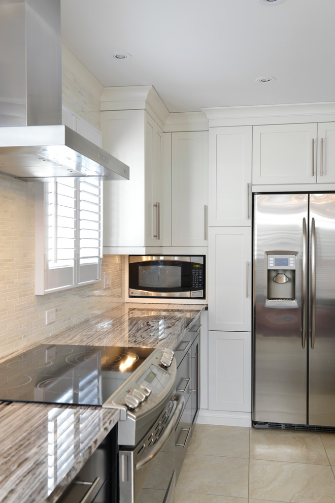 Enclosed kitchen - large transitional u-shaped ceramic tile enclosed kitchen idea in Toronto with an undermount sink, flat-panel cabinets, dark wood cabinets, granite countertops, beige backsplash, matchstick tile backsplash, stainless steel appliances and an island