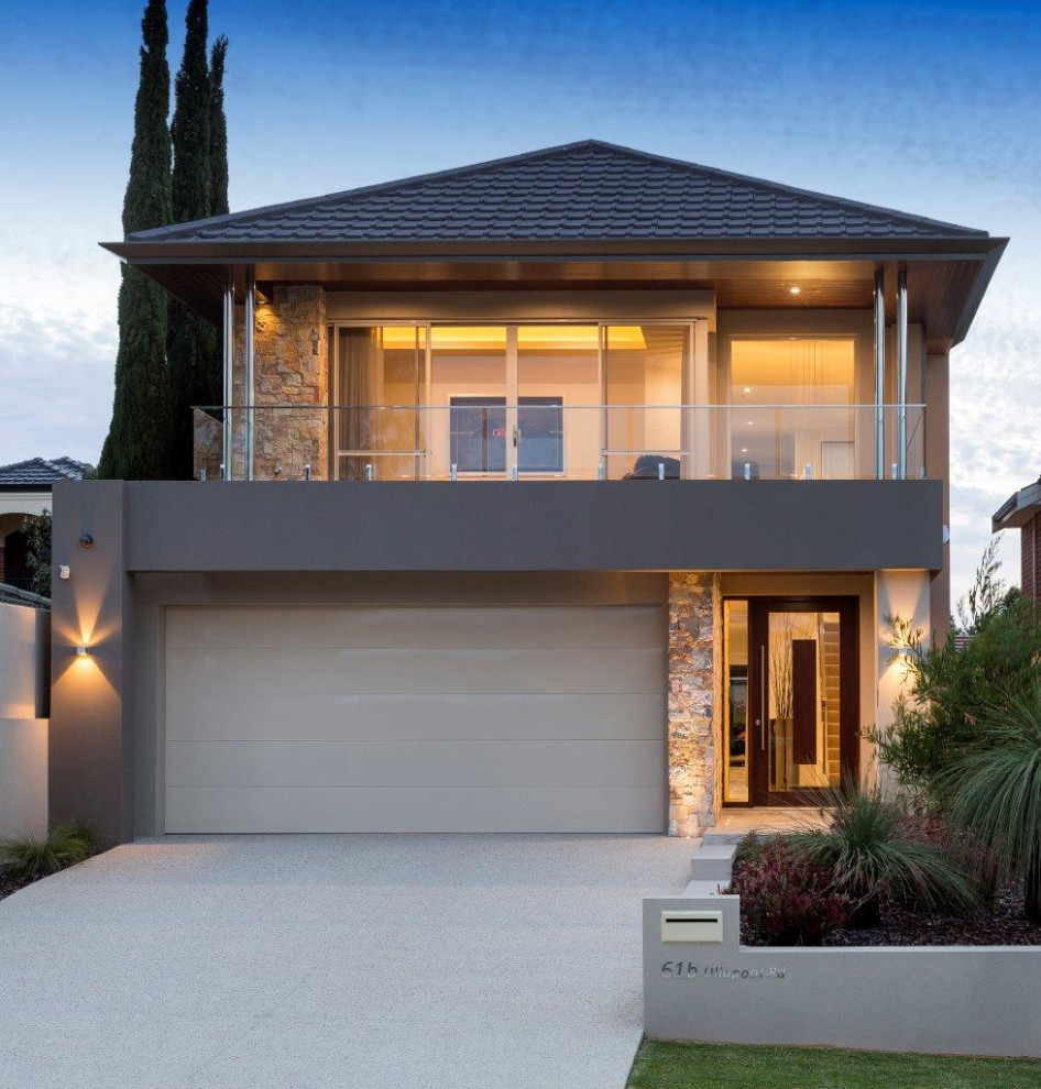 Mittelgroßes, Zweistöckiges Modernes Einfamilienhaus mit Steinfassade, grauer Fassadenfarbe, Satteldach, Ziegeldach und schwarzem Dach in Perth