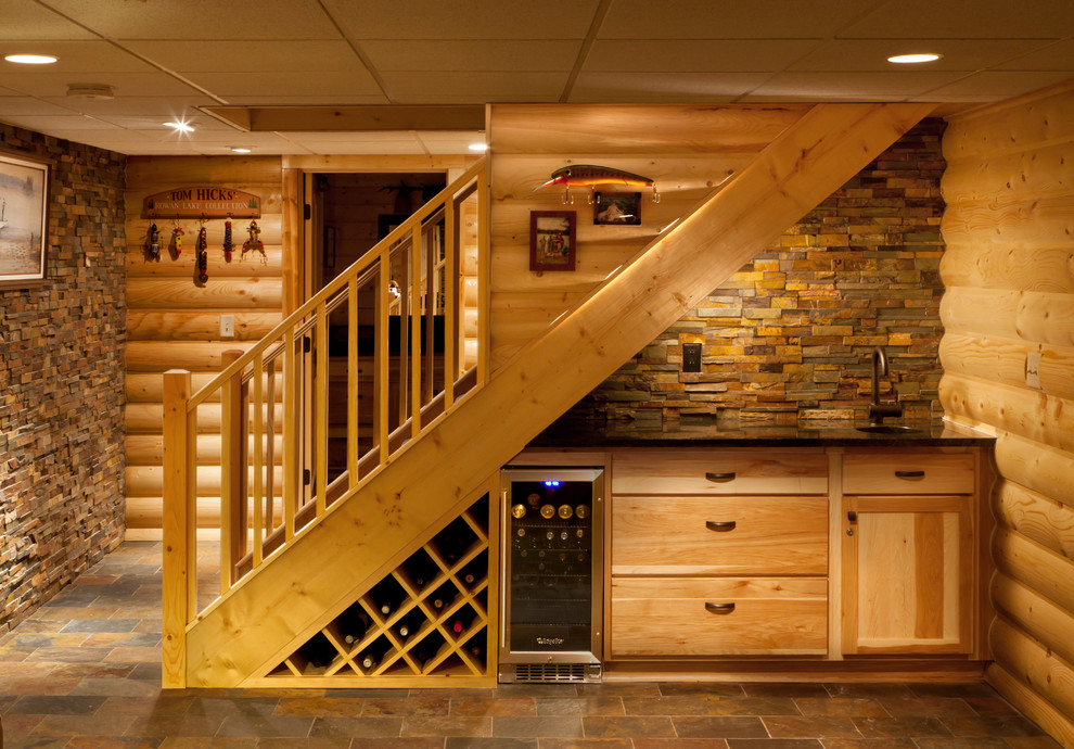 Small country wine cellar in Milwaukee with slate floors.