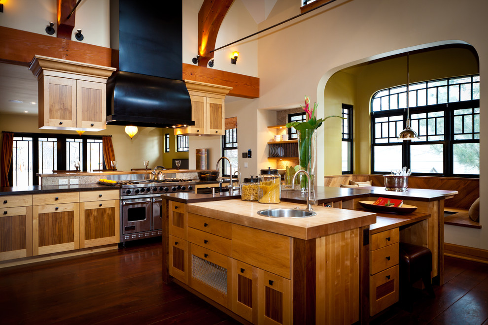 Inspiration for a large country single-wall eat-in kitchen in Denver with shaker cabinets, medium wood cabinets, wood benchtops, stainless steel appliances, with island, a farmhouse sink, dark hardwood floors and brown floor.