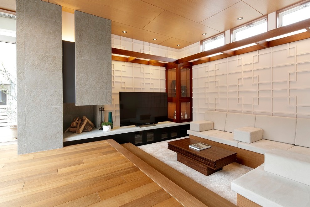 Design ideas for an asian living room in Nagoya with white walls, a freestanding tv and multi-coloured floor.