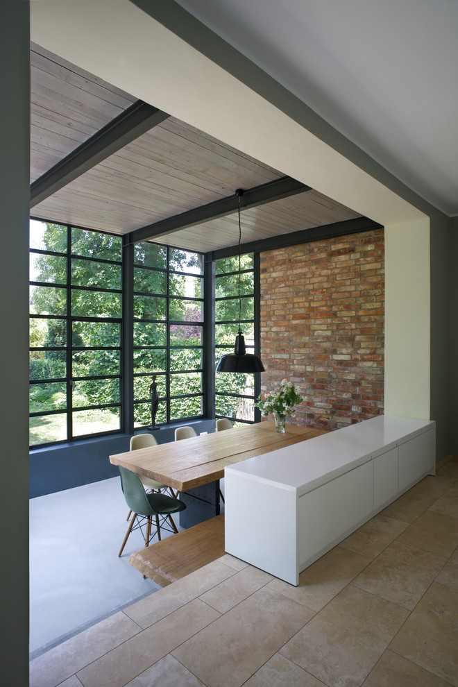 Design ideas for a large contemporary dining room in Berlin with concrete floors.