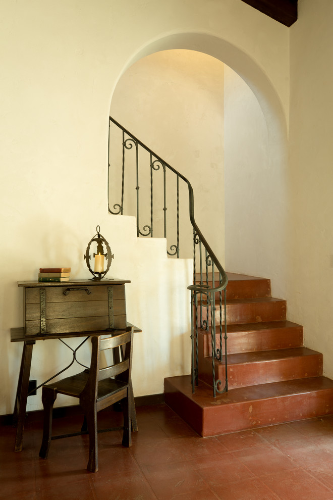 Example of a huge southwest concrete l-shaped metal railing staircase design in Phoenix with concrete risers