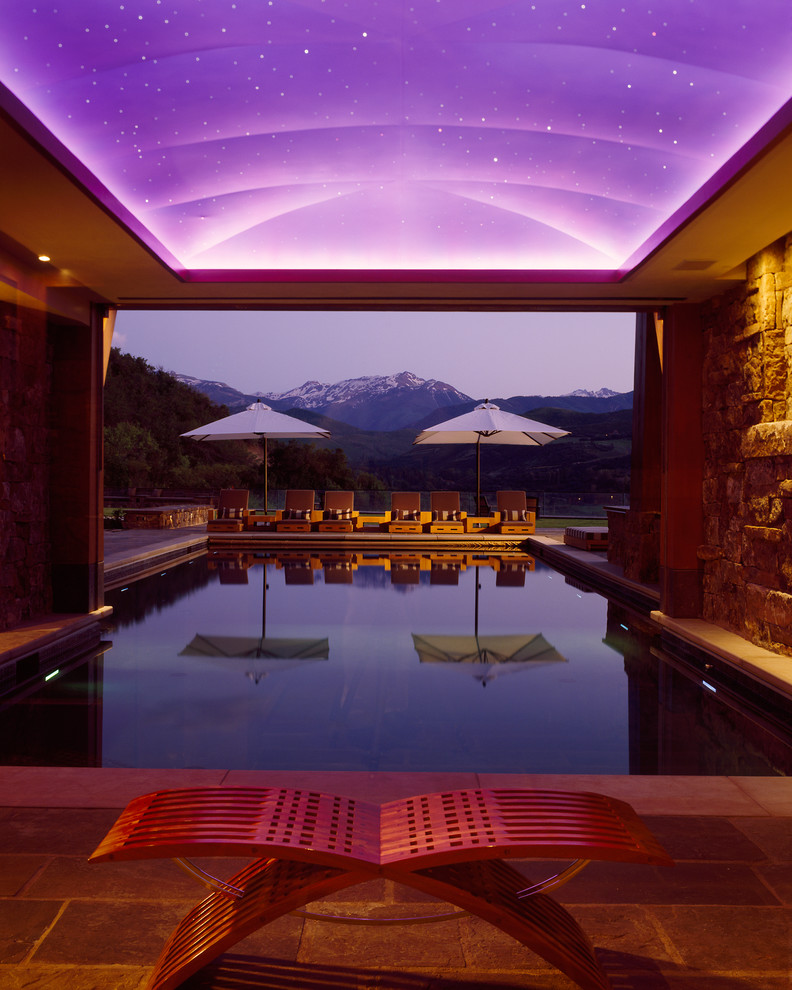 Inspiration for a contemporary indoor pool in Denver.