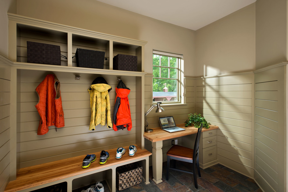 Design ideas for a country mudroom in New York with beige walls.