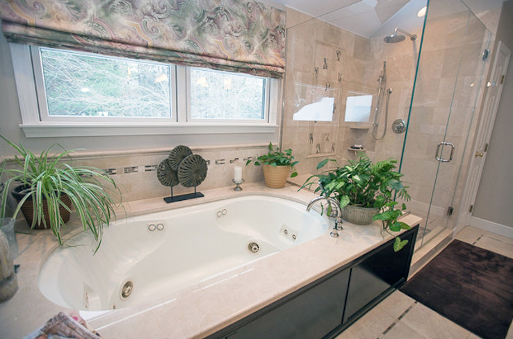 Example of a mid-sized transitional master multicolored tile and matchstick tile ceramic tile corner shower design in Boston with an undermount tub and beige walls
