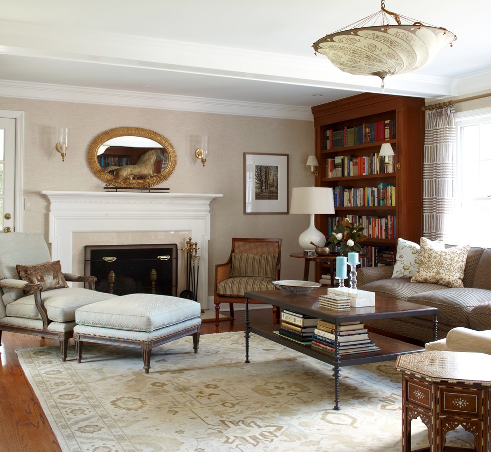 Inspiration for a traditional living room in New York with beige walls.