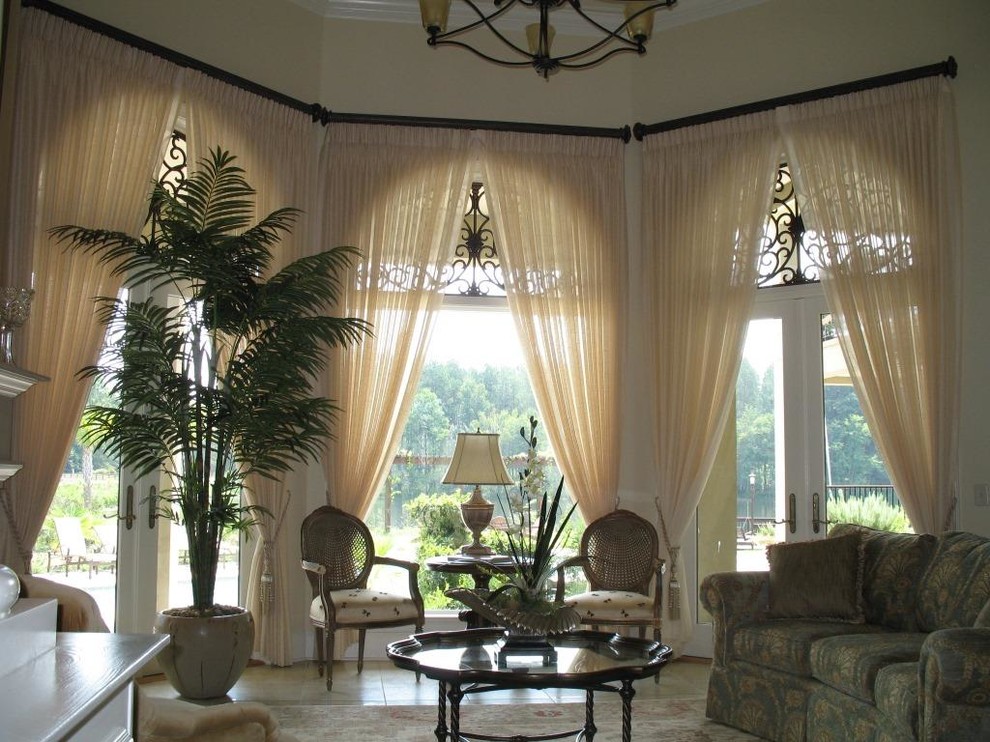 Design ideas for a tropical living room in Atlanta.