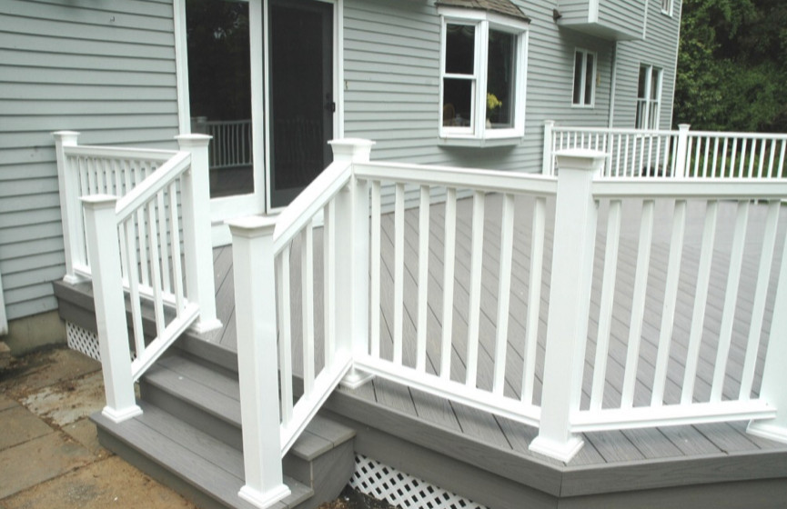 Deck - mid-sized backyard ground level deck idea in New York with no cover