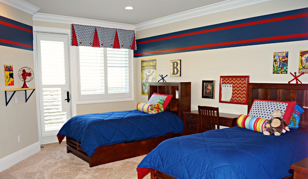 This is an example of a mid-sized transitional kids' bedroom for kids 4-10 years old and boys in Other with beige walls, carpet and beige floor.