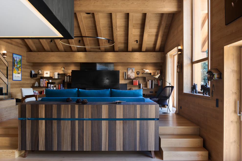 Idée de décoration pour une salle de séjour chalet.